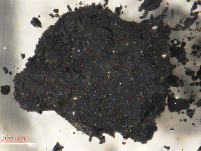 Why Ryugu rock samples are blacker than primitive meteorites